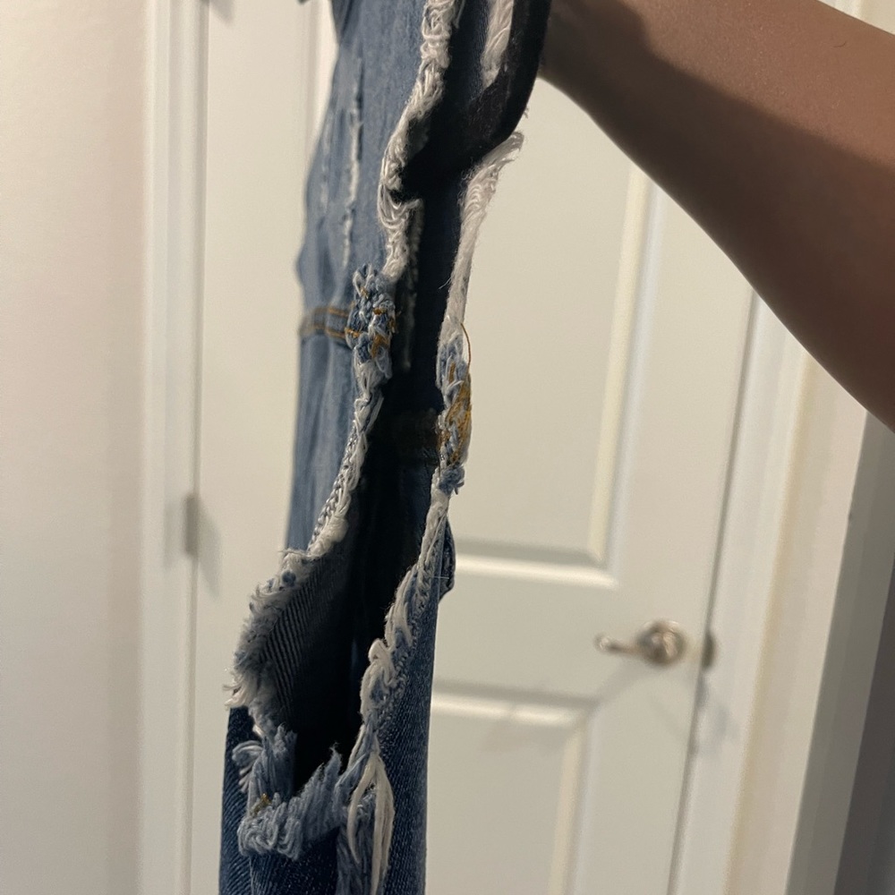 Sleeveless, distressed jean vest - Picture 4 of 5